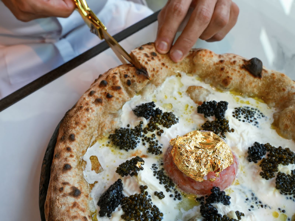 This Dubai Eatery is Serving Pizza Covered with Gold Leaf for Dhs5,200.